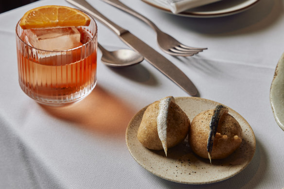 Sfinci (Sicilian-style savoury doughnuts) with white anchovies at Orlo, Collingwood.
