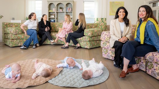 Keshia Hutchens (front left) and Ariel Bryant, founders of From Day One in Melbourne, with members of one of their mother’s groups.