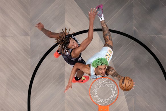 Jeremy Sochan shoots the ball as Noah Clowney defends at Barclays Center in New York.