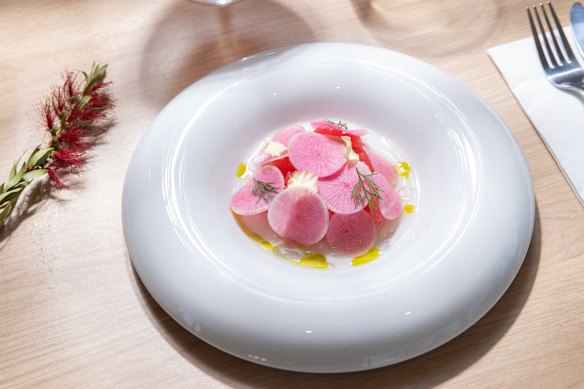 Raw tuna is served with stracciatella and a fragrant lemon-myrtle dressing.