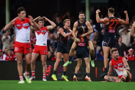Toby Greene celebrates his last-minute match-winning goal against the Swans at the SCG in round