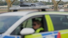Police at RAF Fairford base in south-west England.