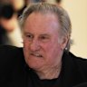 Actor Gerard Depardieu leaves to the courtroom for a break.