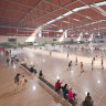 The new indoor sports centre will include **** courts.