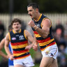 Walker kicks six as Crows cruise to win over Kangaroos