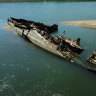 Wreckage of a World War II German warship is seen in the Danube in Prahovo, Serbia, on August 18. The receding waters of the river have revealed a number of vessels sunk during the war.