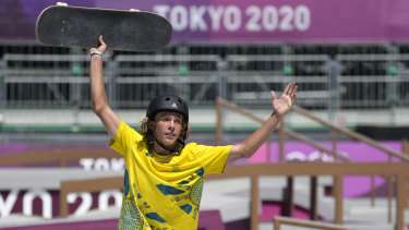 Keegan Palmer celebrates winning the inaugural men’s park skateboarding gold medal.
