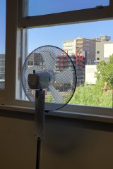 Professor Jason Monty says air flow can be improved by setting up a fan at a window.