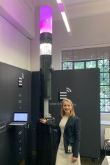 Brisbane City Council infrastructure committee chairwoman Amanda Cooper at City Hall with one of the new smart poles about to be trialled in Brisbane.