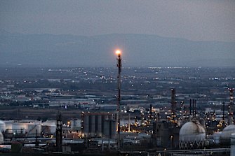 A flare stack burns at an oil refinery in Thessaloniki, Greece.