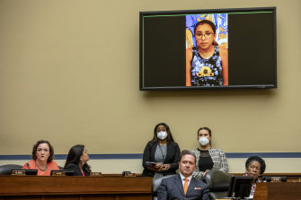 Miah Cerrillo, a survivor of the mass shooting, appears on a screen during a House Committee on Oversight and Reform’s hearing on gun violence.