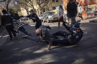 Police clash with protestors in Chippendale.  