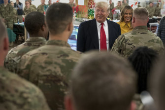 President Donald Trump speaks during a  December 2018 visit to the Ain Asad air base, one of the two facilities hit with Iranian missiles on Wednesday.