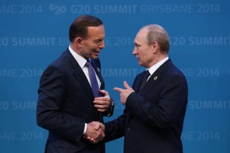 As Prime Minister, Tony Abbott welcomes the Russian President Vladimir Putin to the G20 in Brisbane in 2014.