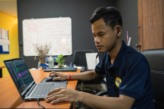 Kea Sokun, a Cambodian rapper, makes music about every day struggles, in his office in Phnom Penh, Cambodia.
