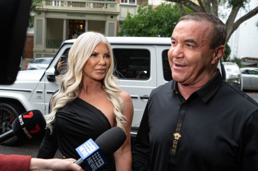Former boxer Jeff Fenech and his wife, Suzee, arrive at the wedding.