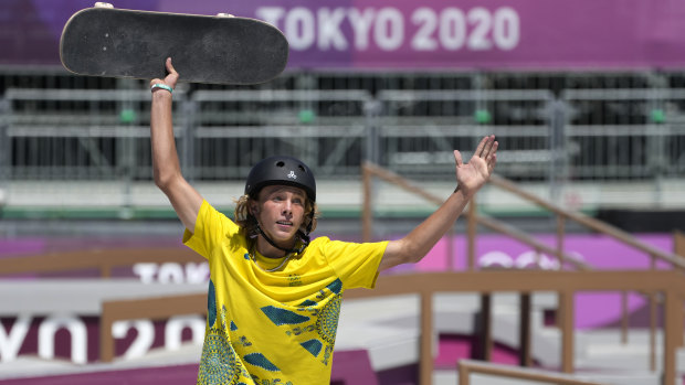 Keegan Palmer celebrates winning the inaugural men’s park skateboarding gold medal.