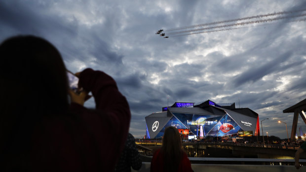 Jets perform a flyover before the Super Bowl in Atlanta.