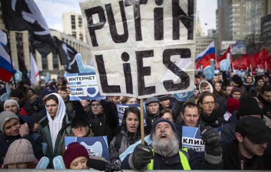 Demonstrators at the Free Internet rally in Moscow protest against a Russian government bill calling for all internet traffic to be routed through servers in Russia – making VPNs ineffective.