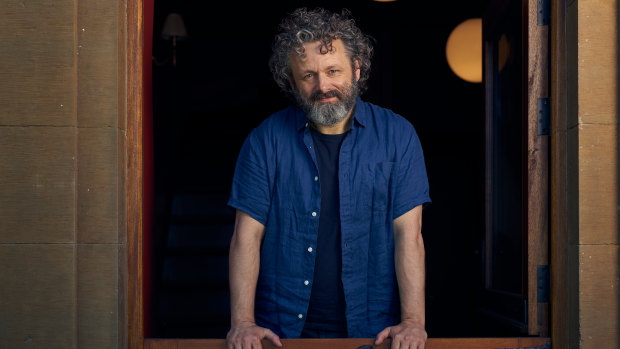 Michael Sheen at his Cardiff home; sketchy wi-fi explains why he's only seen in one setting.