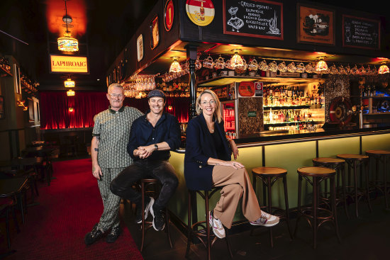 From left: Designer Mike Delany with Dave and Amy Spanton.