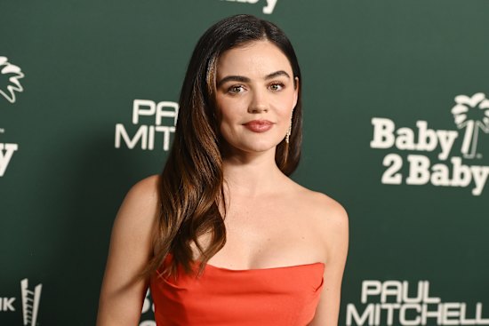 Lucy Hale sporting long and luxurious lock.