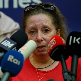 Andrey Kozlov’s aunt, Anna Kozlov, speaks at a press conference with family members of the rescued hostages.