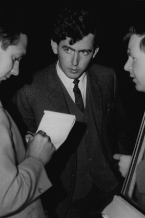 Mr. Barry Robinson, one of three young men who chased and caught a youth after the incident, talking to reporters outside the Town Hall. June 21, 1966.