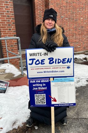Melissa Hinebauch urging people to write-in Joe Biden outside a polling booth in Concord, New Hampshire.