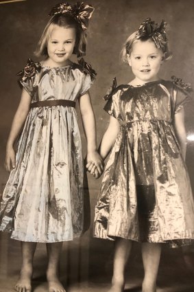 Tamsin (at right, aged 4) with her older sister, Tess.