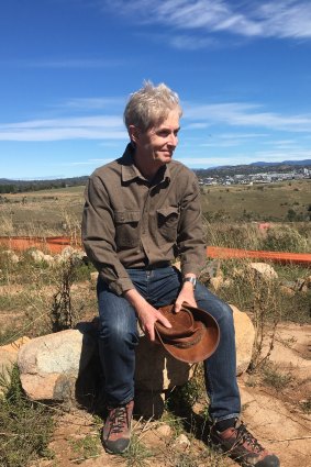 Craig Collins of Coombs sits in the ‘belly’ of the giant roo in the Molonglo River Reserve.