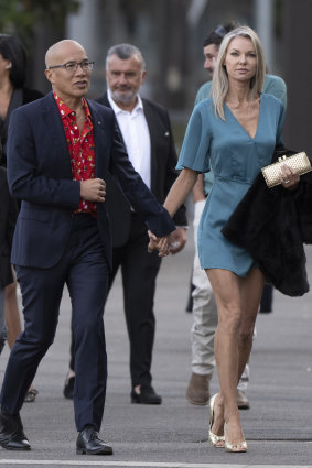 Controversial neurosurgeon Charlie Teo arriving at a fundraiser for his foundation with his partner Traci Griffiths.