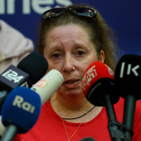 Andrey Kozlov’s aunt, Anna Kozlov, speaks at a press conference with family members of the rescued hostages.