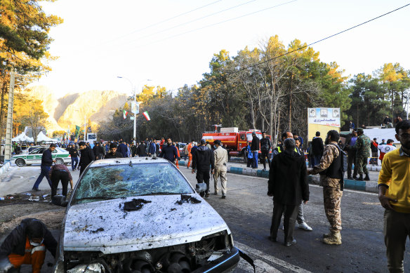 People gather at the site of an explosion in the city of Kerman, about 820 kilometres southeast of the capital Tehran, Iran.
