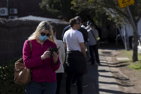 People wearing masks in the queue at the Rushcutters Bay testing clinic earlier this week.