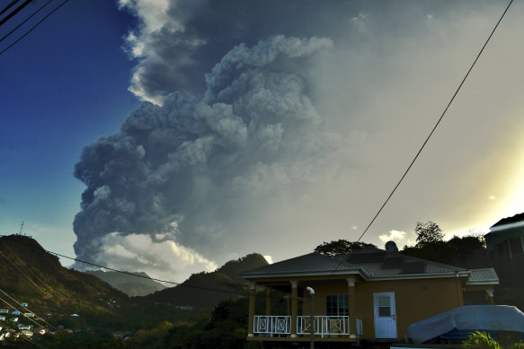 Ash rises into the air as La Soufriere volcano erupts on the eastern Caribbean island of St Vincent on Tuesday.