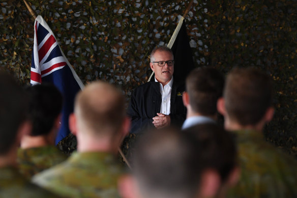 Prime Minister Scott Morrison speaks with special forces troops during a visit to Iraq last year.
