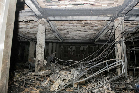 Part of the interior of the ground floor of a building which was gutted by fire on August 31.