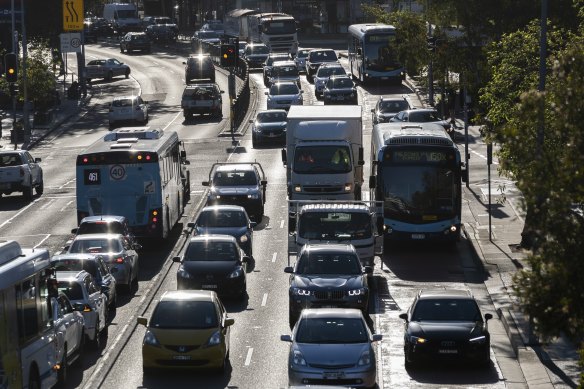 Peak hour traffic along Military Road in Mosman.