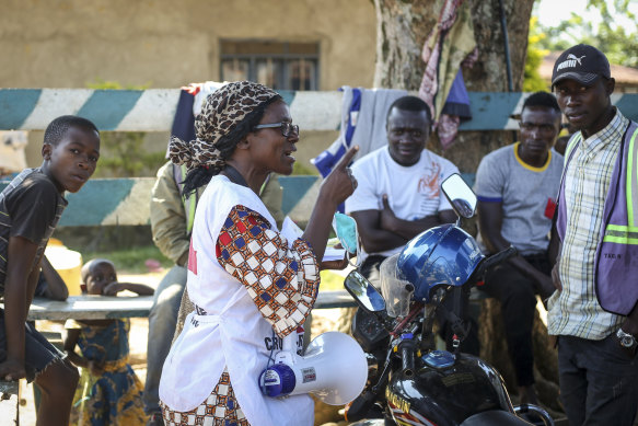  Katungo Methya, 53, who volunteers for the Red Cross educating the public about epidemics, talks about coronavirus prevention in Beni, eastern Congo.  “It’s so upsetting to have this second disease. We lost so many people through Ebola, a lot of deaths, now corona,” she said. “Everyone is really afraid.”
