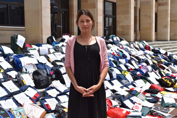Square Peg Round Whole WA branch coordinator Symone Wheatley out the front of state parliament.