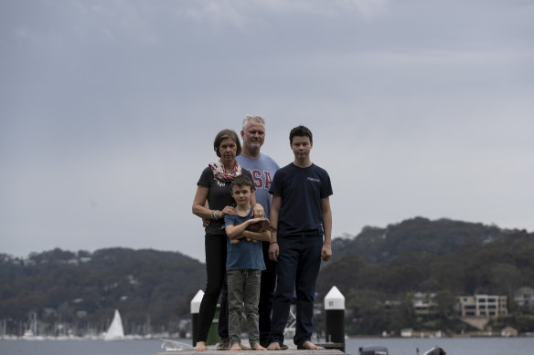 Guy and Zoe Eilbeck at their Scotland Island home with their children Cameron, 13, and Max ,8.