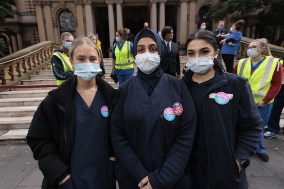 Auburn midwives Olivia Enderson, Muskan Chnonyin and Rayhana Mohammad at Sydney Town Hall.