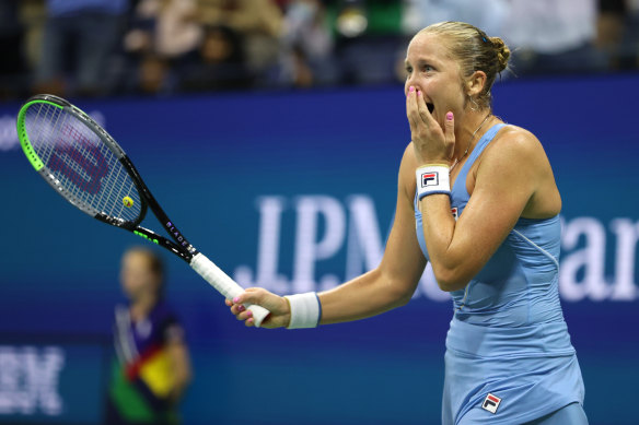 Shelby Rogers celebrates after winning match point against Ash Barty.