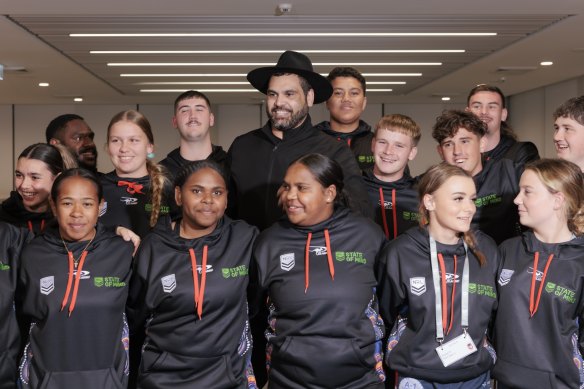 Greg Inglis and children at a youth summit to coincide with the NRL’s Indigenous round on Thursday. 