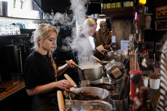 Chai is brewed to order in simmering pots of tea and milk.