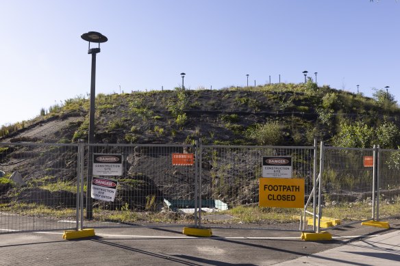 The parkland built over the old Alexandria tip remains closed due to downpours washing away soil.