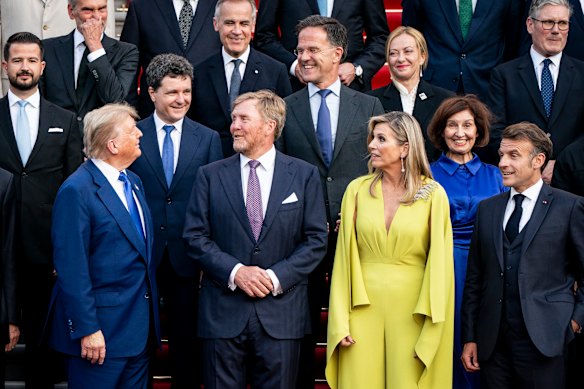 US President Donald Trump talks to Dutch King Willem-Alexander and Queen Maxima, and NATO Secretary-General Mark Rutte (rear centre), at the summit in The Hague on Tuesday.