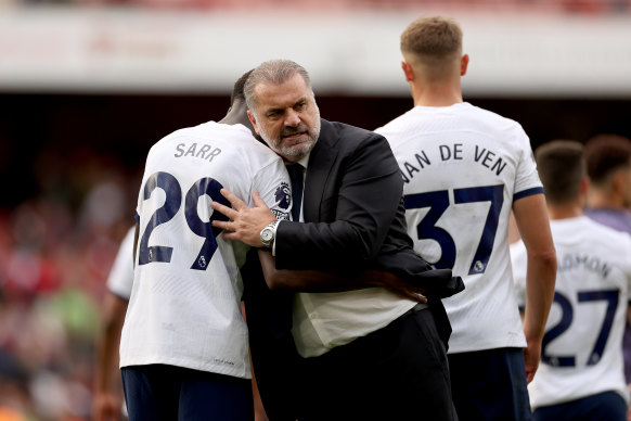 Ange Postecoglou embraces Pape Matar Sarr after Spurs’ draw with Arsenal.