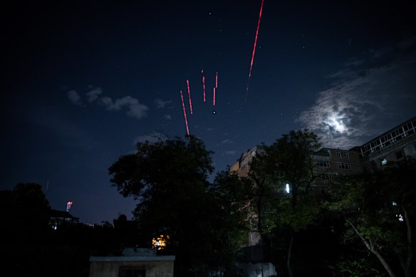 Taliban forces fire tracer rounds to celebrate the withdrawal of US forces in Kabul on August 31, 2021. 